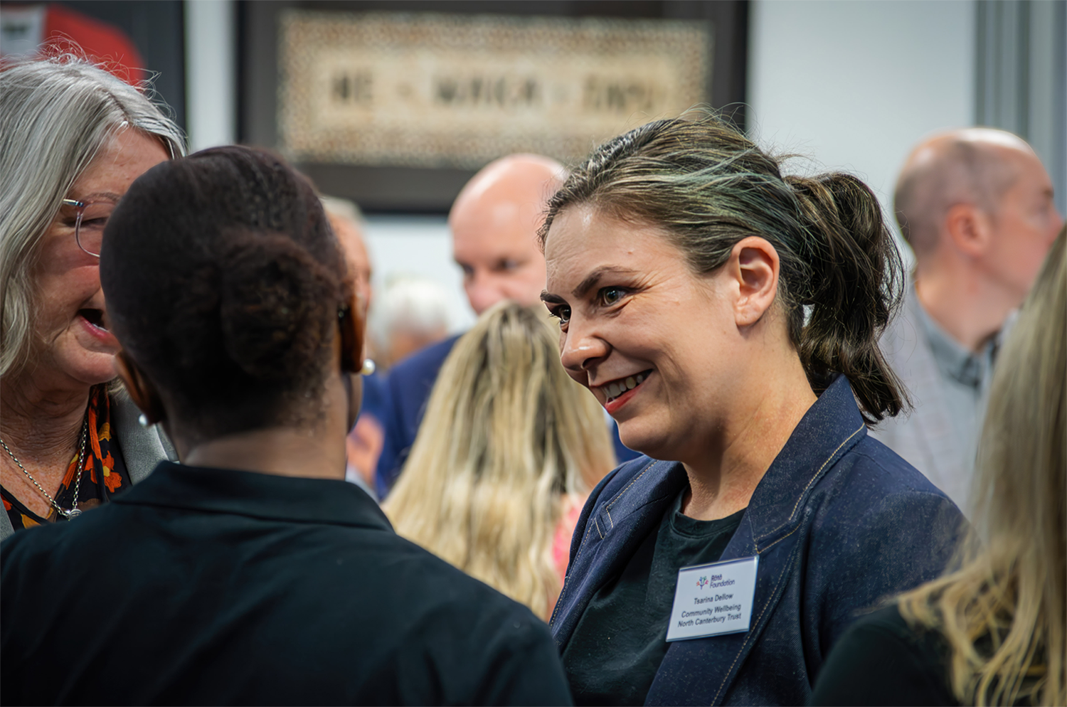 Image of thre women talking