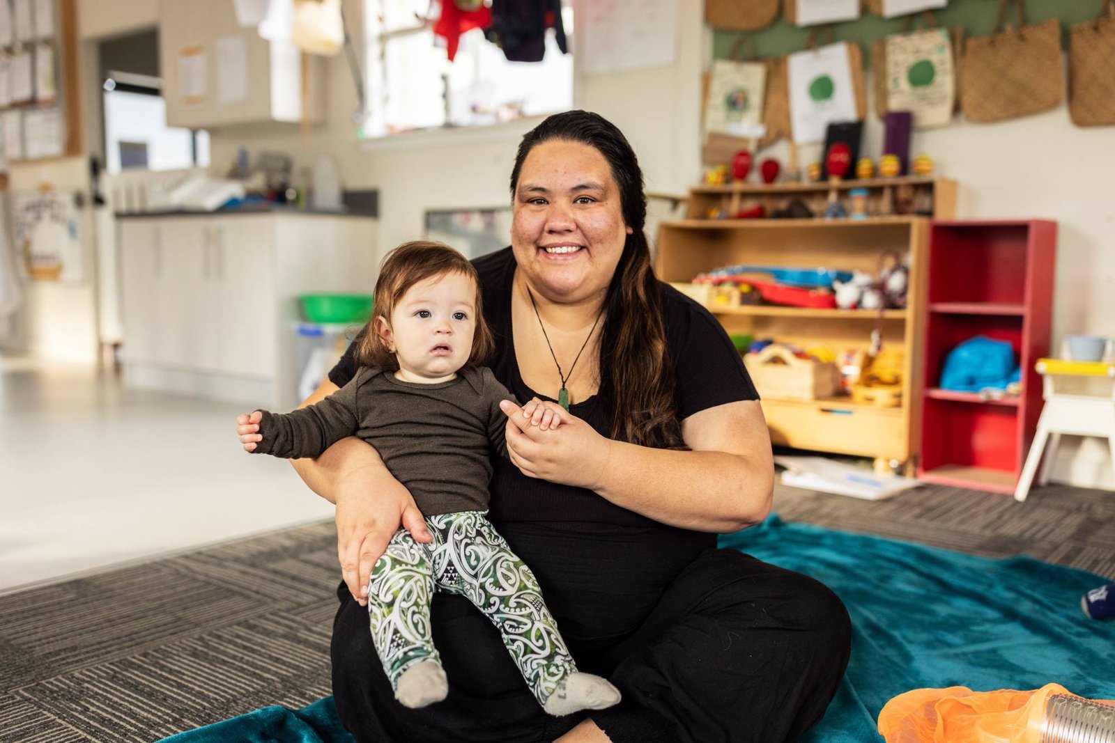 Image of women holding a child